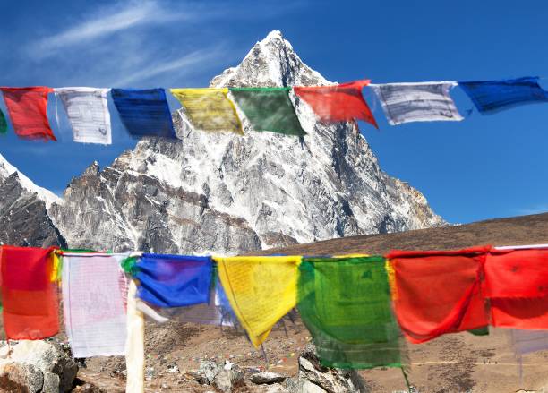 istock prayer flags and Nepal Himalayas mountains 959961536