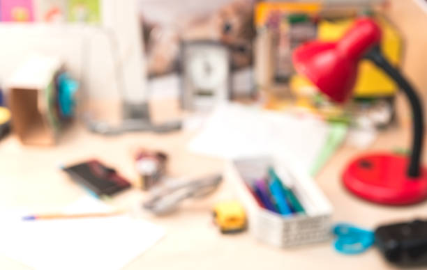 istock Defocused photo of children school workspace 959966036
