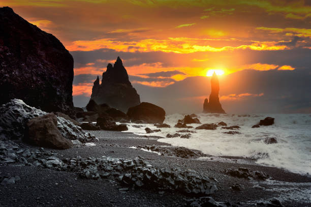 istock Vik and Basalt Columns at sunset, Black Sand Beach in Iceland. 959967036