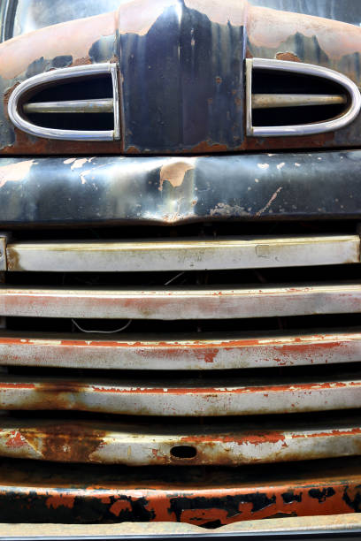 istock Old rusty truck hood grill front view 959969770