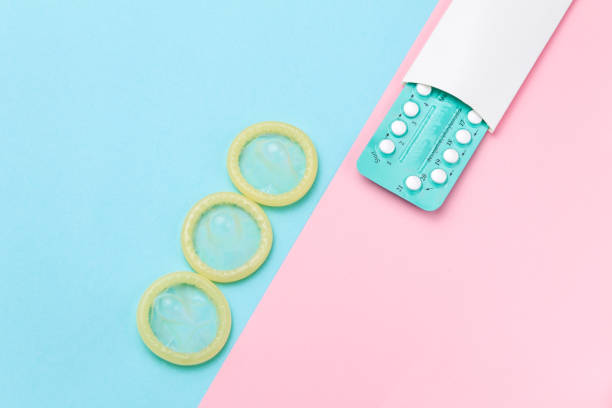 istock Contraceptive pills and condoms 959970218