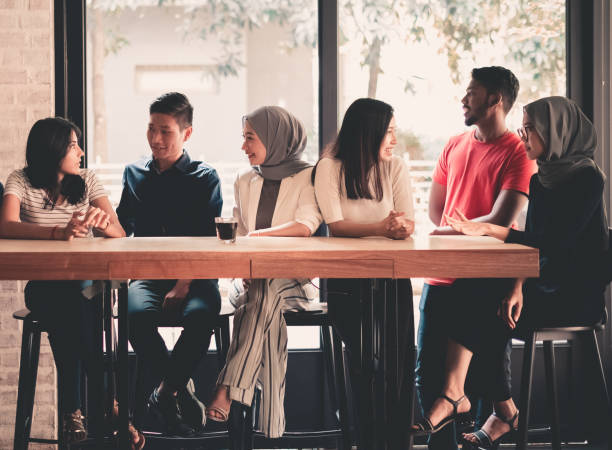istock young adults friends gathering at cafe 959971430