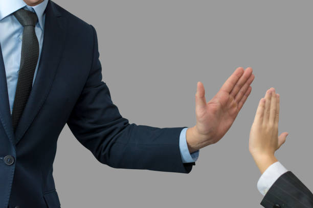 istock father and son in formal wear giving high five 959971616