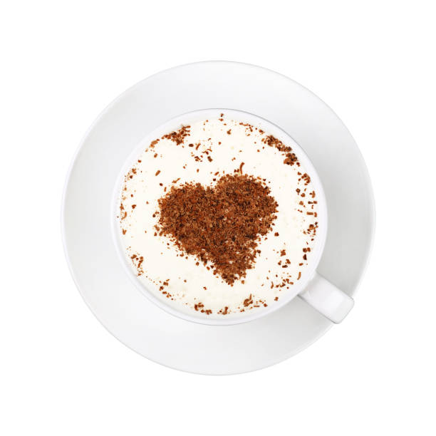 istock White cup of cappuccino coffee on saucer isolated 959977286