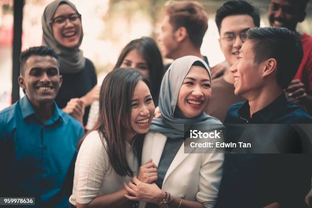 A Group Of Young Adults Gathering Stock Photo - Download Image Now - Malaysia, Multiracial Group, Malaysian Ethnicity