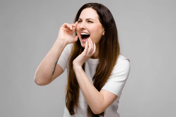 istock Attractive woman laughing 959982086