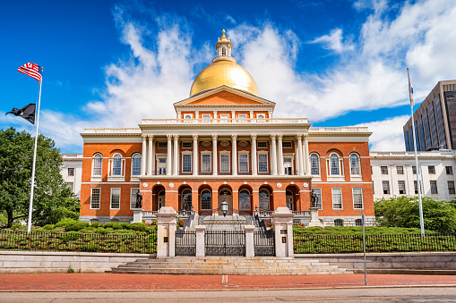 Stock photograph of the landmark Massachusetts State House, the state capitol of Massachusetts, USA, located in downtown Boston.