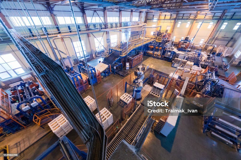 Manufacturing factory Top view of modern operational plant producing fiberglass heavy industry machinery metalworking workshop concept. Manufacturing Stock Photo