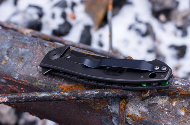 istock Folded knife made of titanium. 959990840