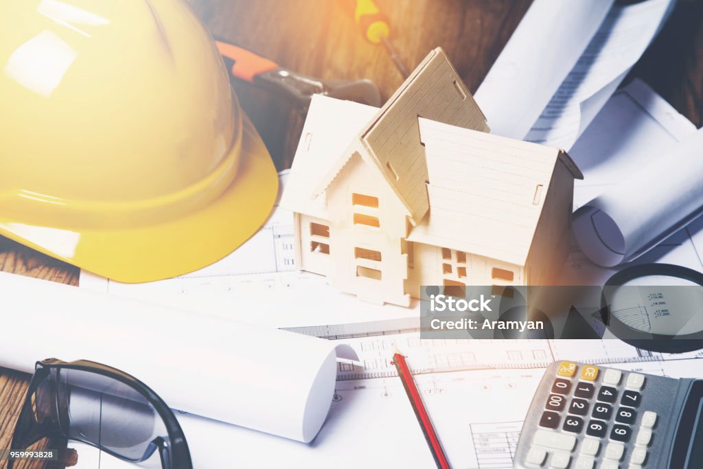 house model with architecte tools on table Construction Industry Stock Photo