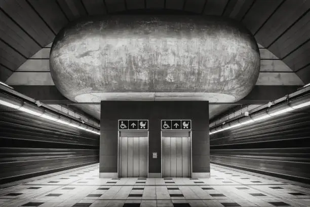 Photo of subway station with convergent lines