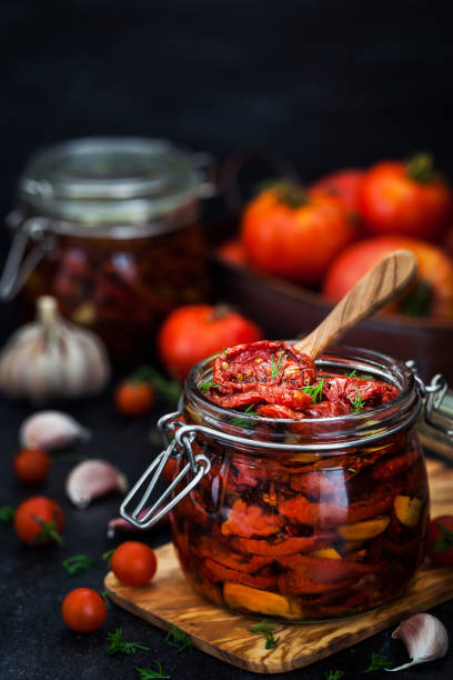 istock Sun dried tomatoes with garlic and olive oil 959997724