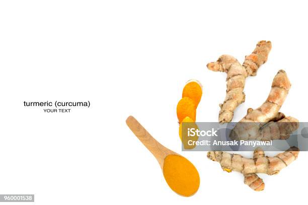 Fresh Turmeric And Powder In A Wooden Spoon On A White Background With Clipping Paths Stock Photo - Download Image Now