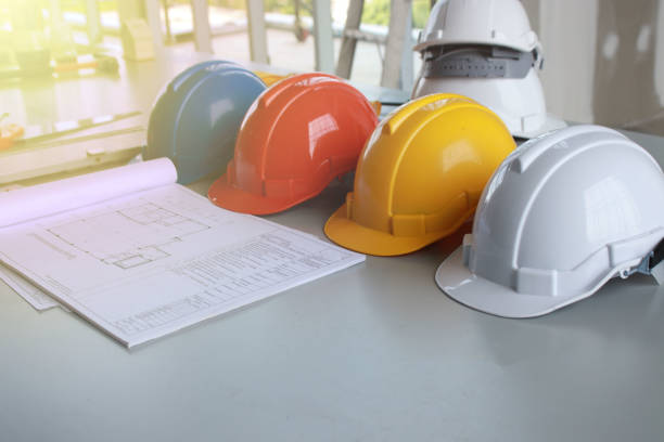 istock safety helmet and the blueprint 960001726
