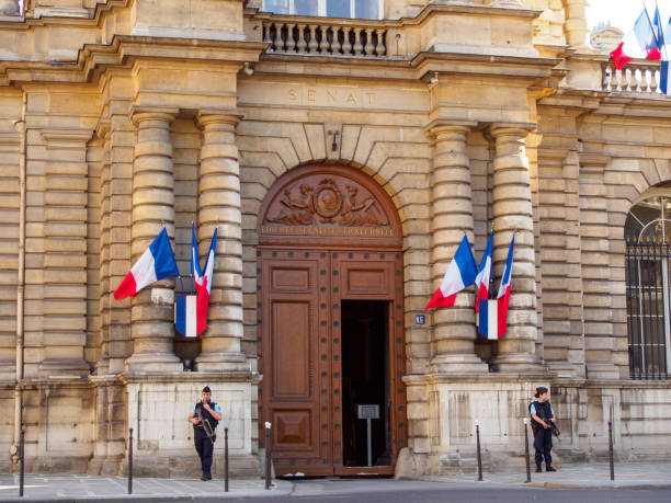 Gendarmerie police officers guard entrance to French Senate, Paris, France stock photo