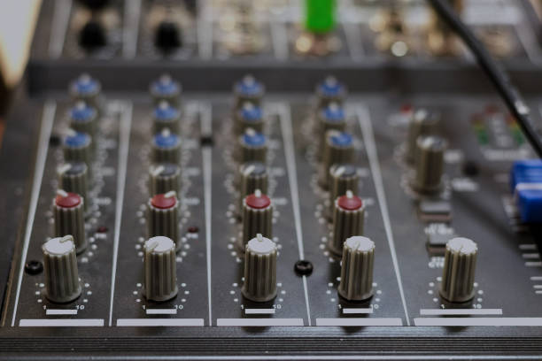 istock Audio mixing board. Sound mixing console and buttons of mixer controller. Toned. 960008704