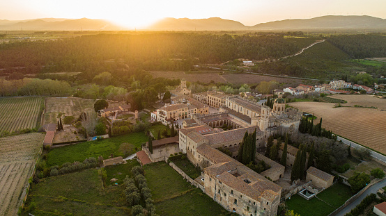 Sunset over monastery of Santes Creus. Completed in 1225 it is one of the most important cistercian monasteries in Catalonia. In 1835 the monks left the monastery and was declared a national monument in 1921