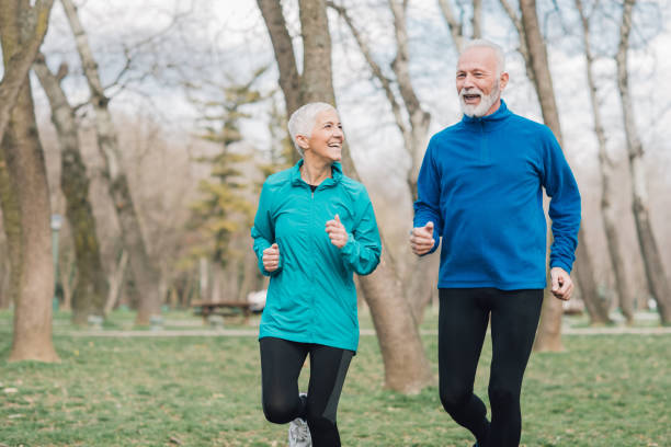 istock Happy fit people running in the park 960016104