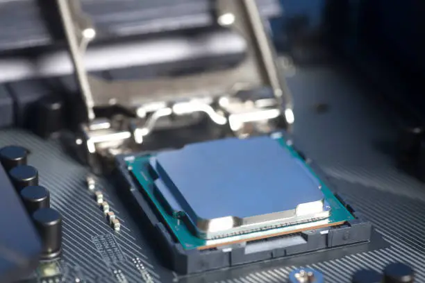 CPU in socket Intel LGA 1151 on motherboard Computer PC close up