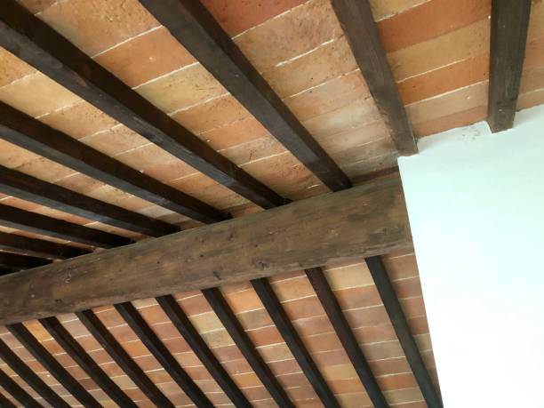 istock Ceiling detail in ancient wooden beams and bricks 960021500