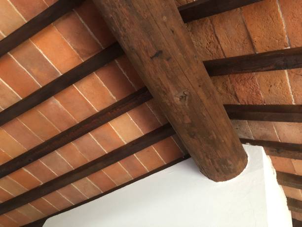 Ceiling detail in ancient wooden beams and bricks