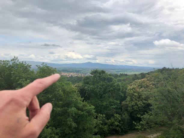 istock Finger indicating a point in the landscape 960021516