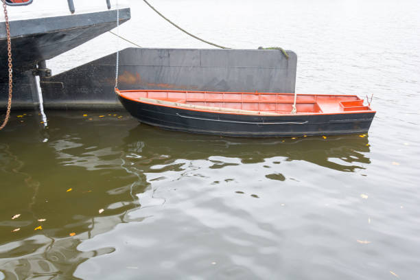 istock Lifeboat tied for cargo ships at the rudder 960023696