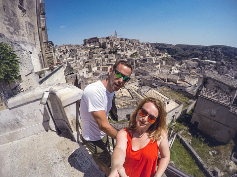 Adult Couple Tourists Taking a Selfie in Puglia Town.