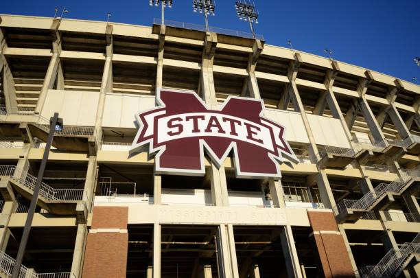 West side of Davis Wade football stadium at MSU Mississippi State University, Mississippi, USA - April 16, 2018: Large M State and engraved Mississippi State signs on the west side of Davis Wade Stadium at MSU. mississippi state university stock pictures, royalty-free photos & images