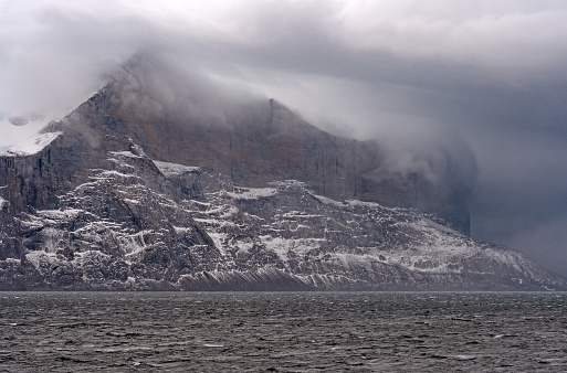 Clouds Enveloping the Peaks in a Coastal Storm in Sam Ford Fjord on Baffin Island in Nunavut, Canada