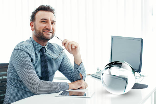 istock Businessman and Crystal Ball 960045810