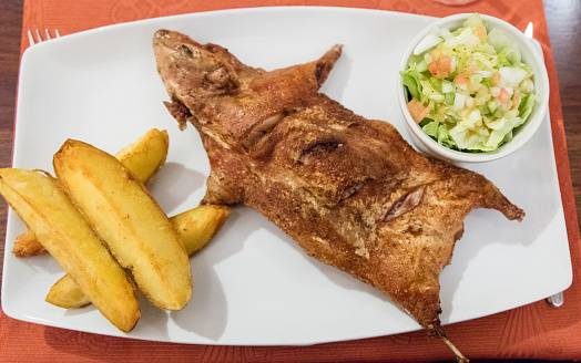 Cuy  ( cooked Guinea pig), typical andean dish