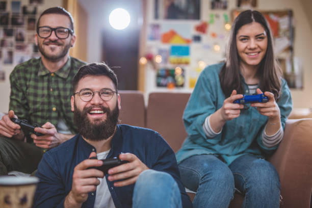 istock Friends at home playing games 960046636