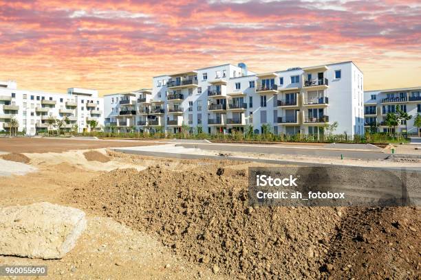 New Urban Development With Construction Site And Modern Residential Buildings Stock Photo - Download Image Now