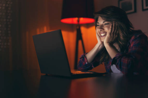 istock Young woman watching a movie 960058690