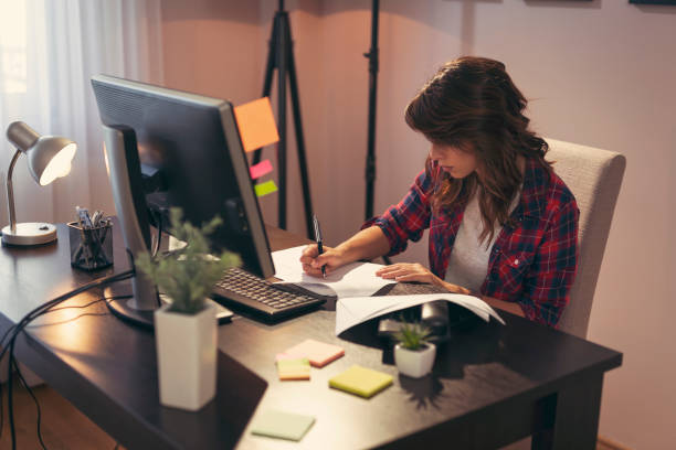 istock Young woman working in a home office 960058844