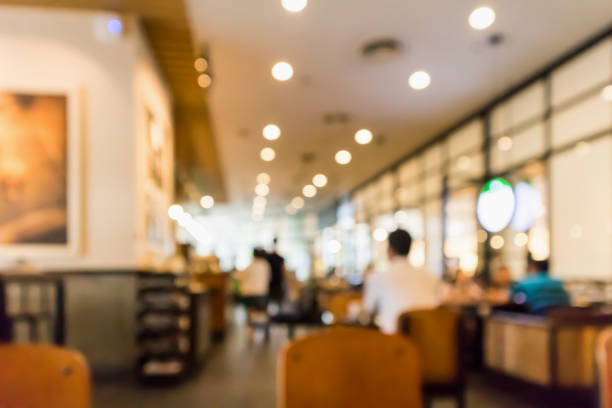 istock Restaurant cafe or coffee shop interior with people abstract defocused blur background 960078518