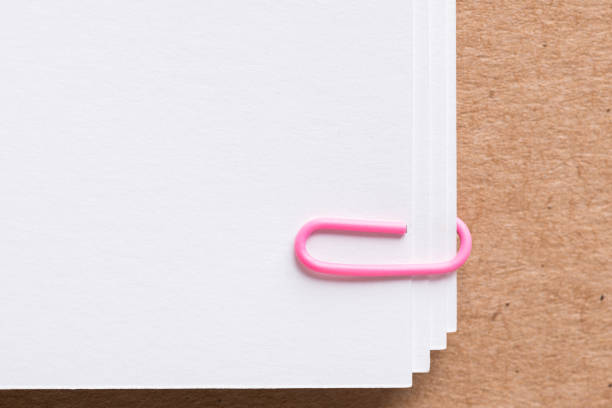 istock Paper clip with blank white business card 960078692
