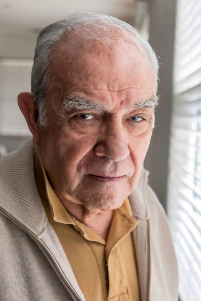 istock Pensive senior man looking at the camera 960082928