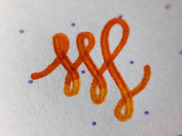 istock Fountain pen writing ink on paper close up 960090050