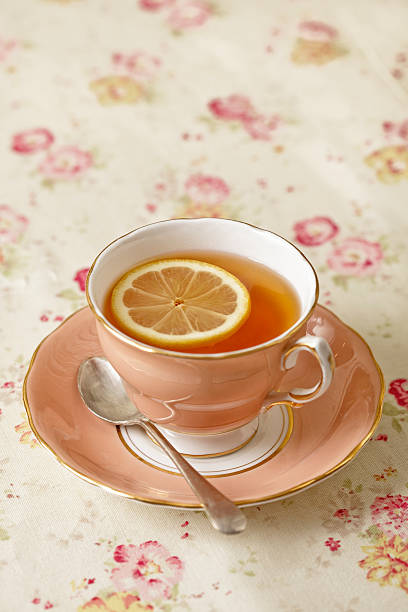tea with a slice of lemon stock photo