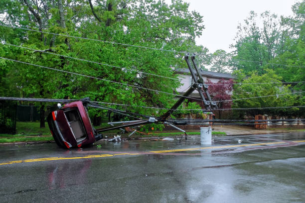 istock Storm damaged electric pole car turned over after accident 960097858