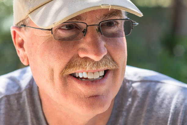 istock Senior male laughs at conversation 960120462