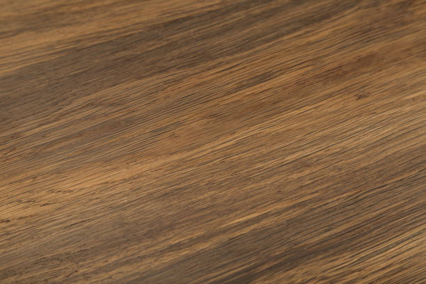istock Brown scratched wooden cutting board. Wood texture 960121964