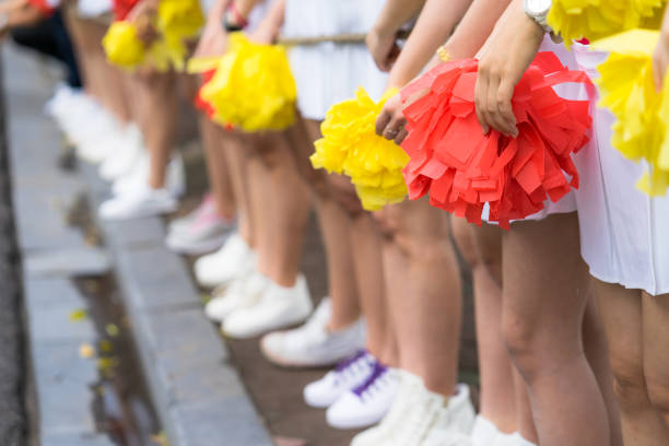 istock Asian young cheerleader group closeup with legs standing on row 960135290