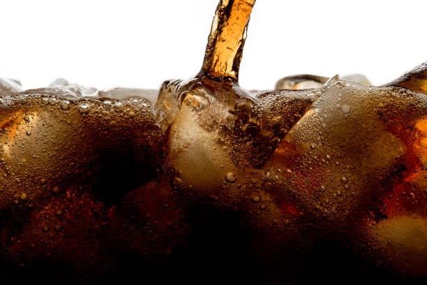 istock Pouring cola soda with ice and bubble on front view white background cold drink beverage 960143168