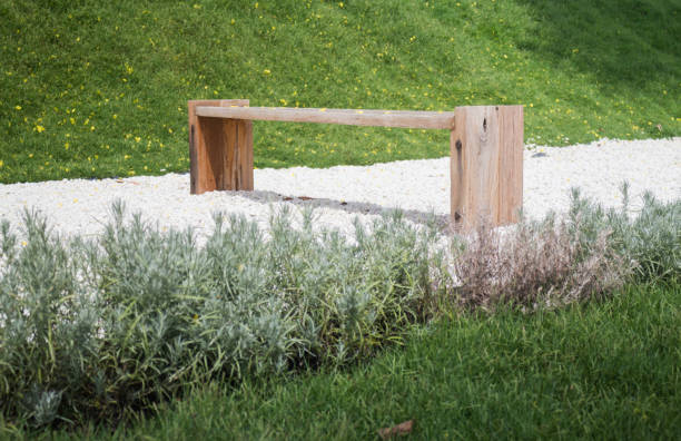 istock Wooden bench in rock garden 960145386