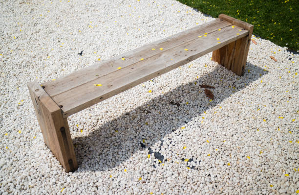 istock Wooden bench in rock garden 960145436