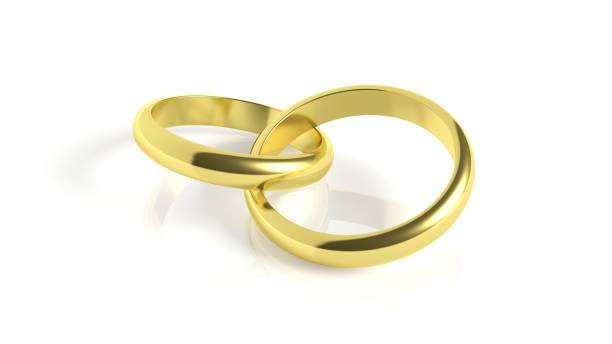 istock Pair of gold wedding rings 960155618