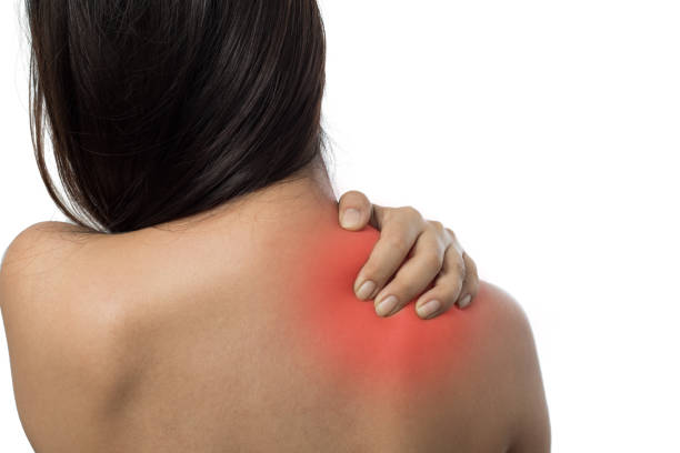 istock Woman with shoulder pain isolated on white 960156346